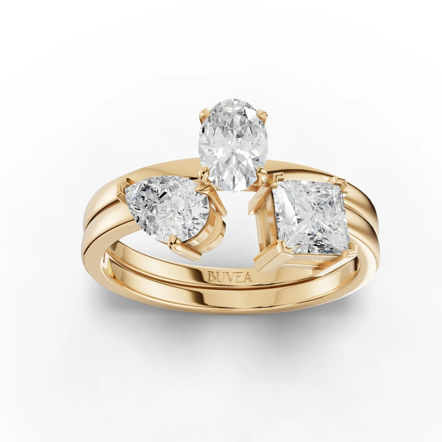 Asymmetrical three-stone lab-grown diamond ring yellow gold top view