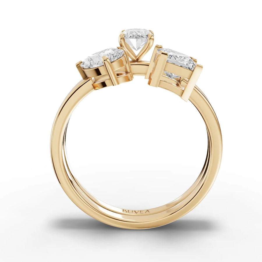 Oval pear princess ring yellow gold close-up