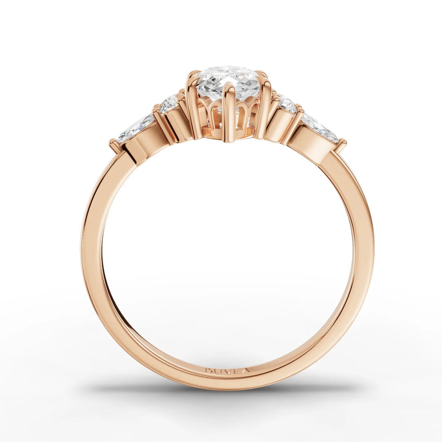 Marquise and round diamond ring rose gold close-up view