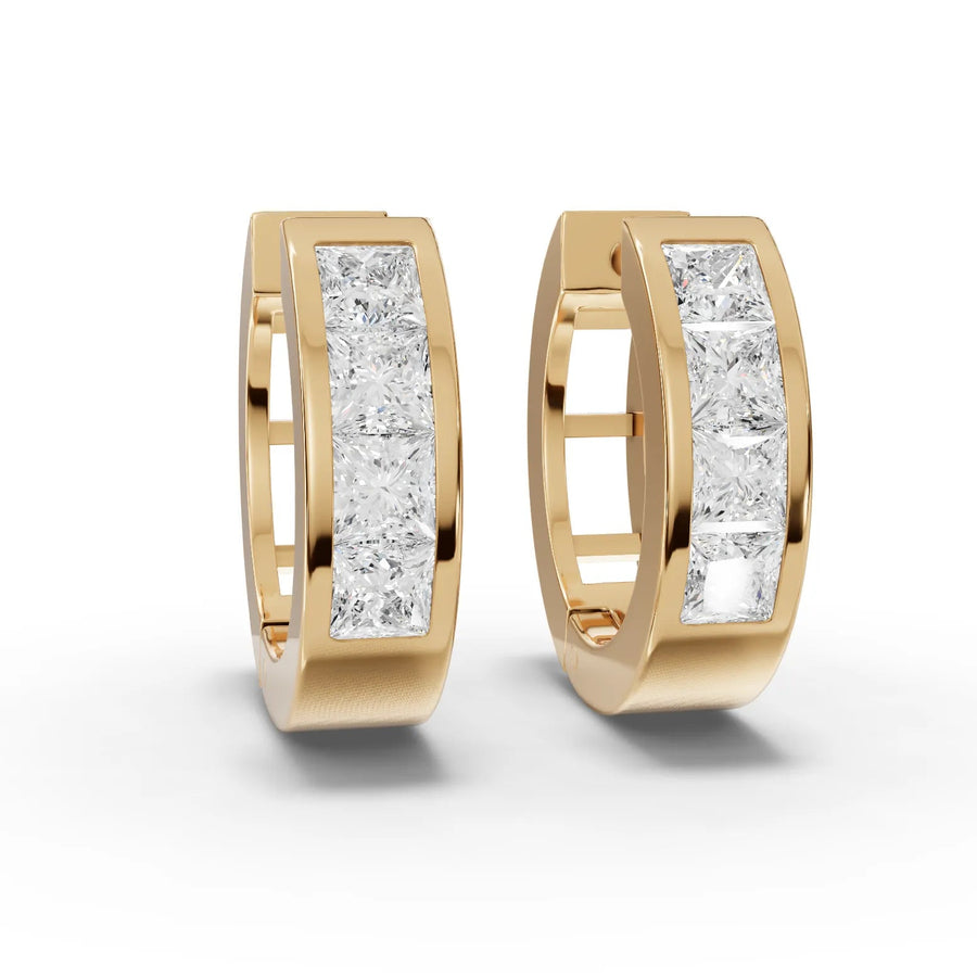 1.35 CT lab-grown diamond channel set huggie earrings yellow gold front view