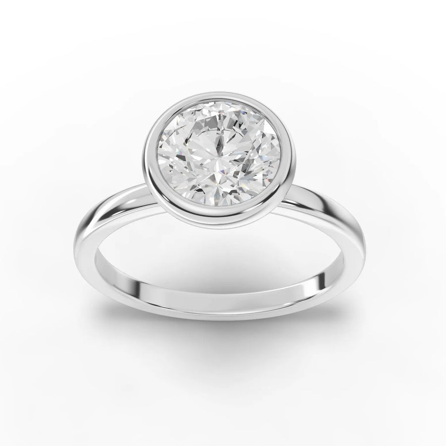 1.50 ct bezel round lab diamond solitaire ring with full bezel setting and smooth band