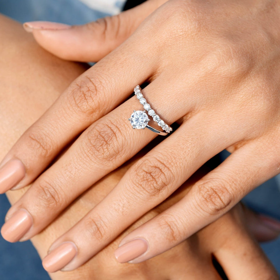 1.50 CT round solitaire lab-grown diamond ring worn on hand