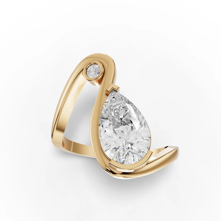Pear accent ring yellow gold angle