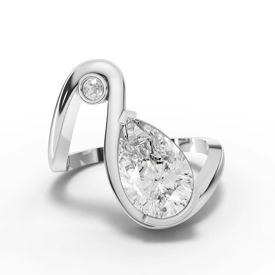 2.05 ct pear lab diamond ring with bezel-style bypass setting and round accent diamond