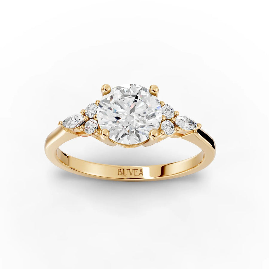 Round and marquise diamond ring yellow gold angle