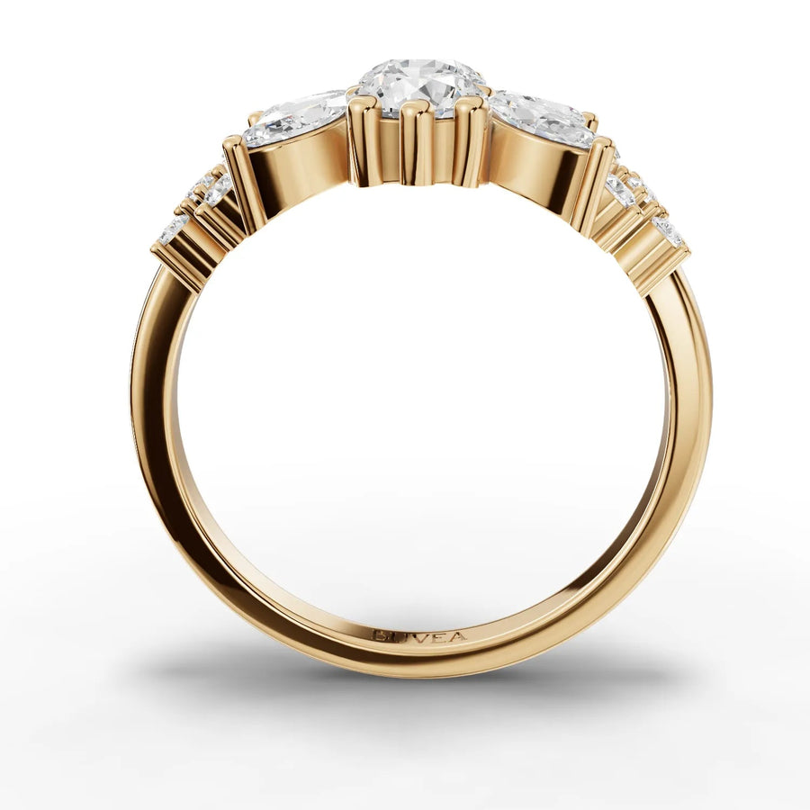 Multi-shape diamond ring yellow gold close-up