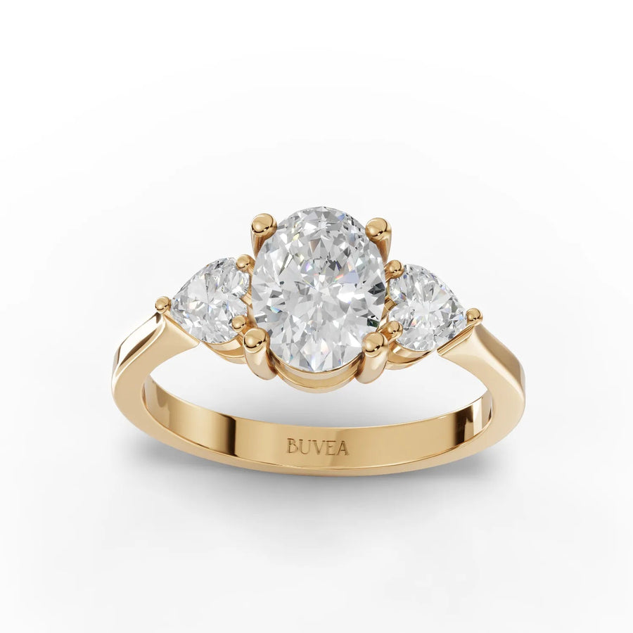 Oval three-stone lab-grown diamond ring yellow gold top view