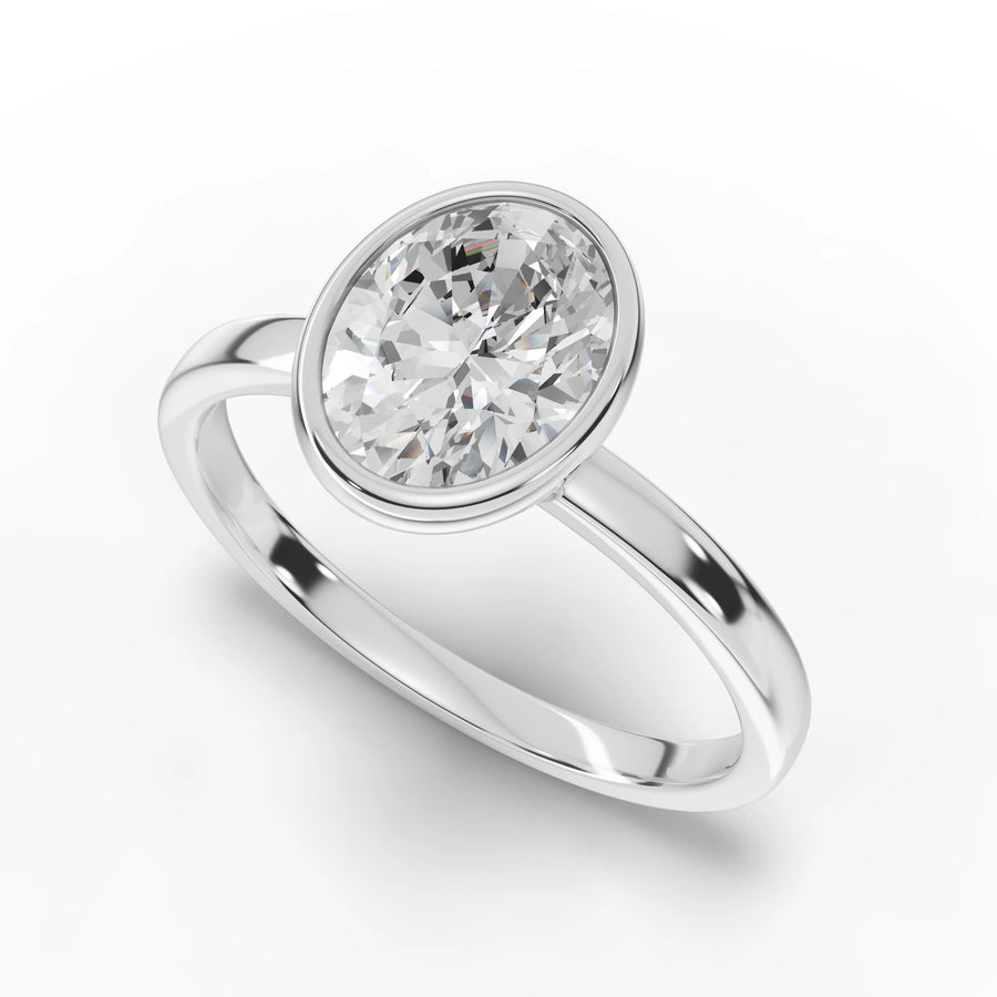 Oval bezel diamond ring white gold angle