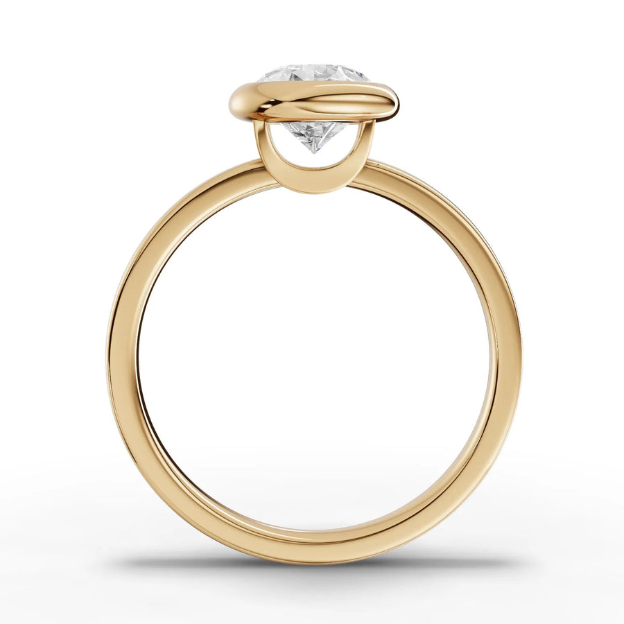 Pear bezel lab-grown ring yellow gold close-up