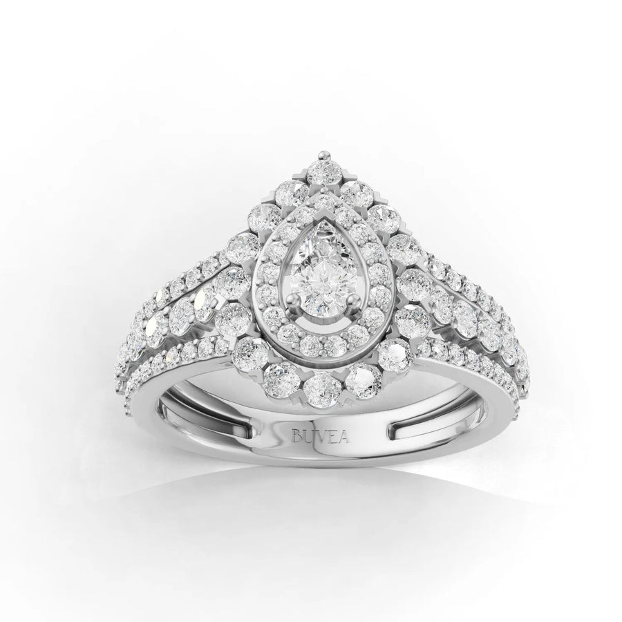 1.25 CT pear double halo pavé lab diamond ring in 18K gold with 0.25 ct center and triple-row band