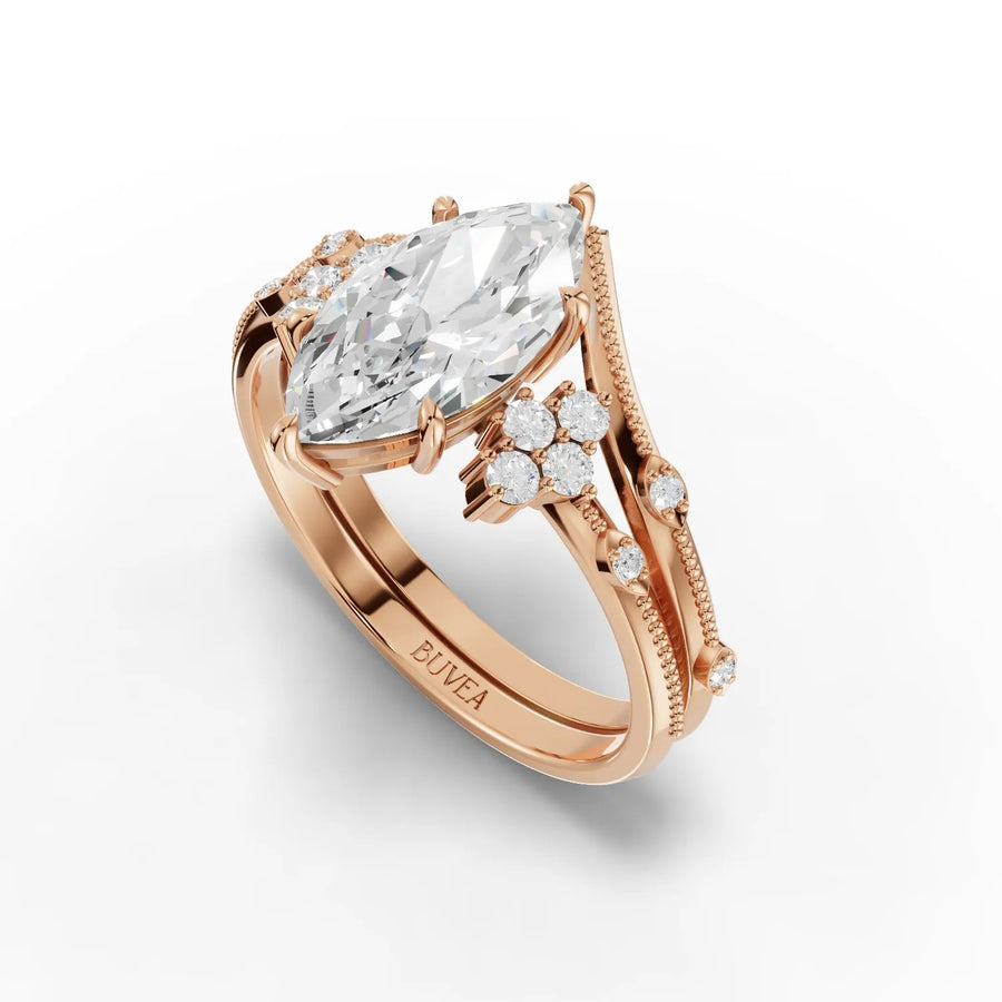 1.65 Ct marquise lab diamond ring with a rose gold band, featuring accent stones and a floral design detail.