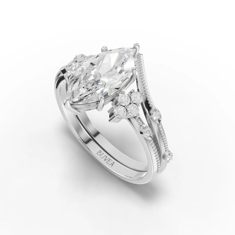 1.65 Ct marquise lab grown diamond ring features a large center stone and delicate accent stones, set in a polished white metal band.