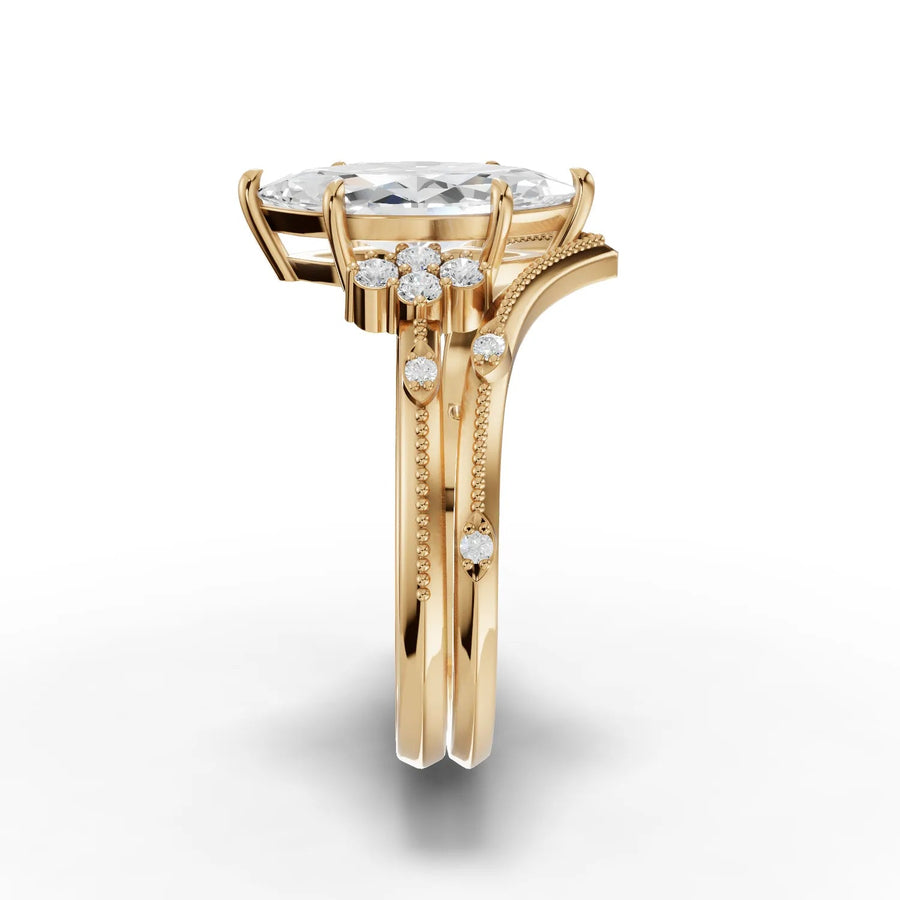 1.65 Ct marquise lab grown diamond ring featuring a prong setting and accent stones on a polished yellow gold band.