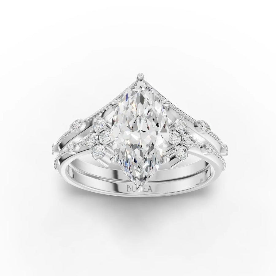 Marquise lab diamond ring featuring a 1.5 Ct center stone, accented by smaller round diamonds on a white gold band.