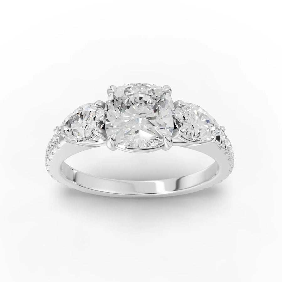 2.32 CT cushion three-stone pavé lab-grown diamond ring with 1.50 CT center and pear side stones