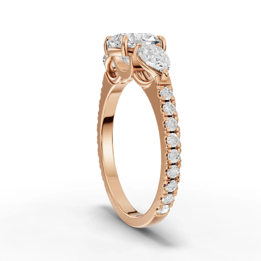Lab-grown cushion three-stone ring side profile