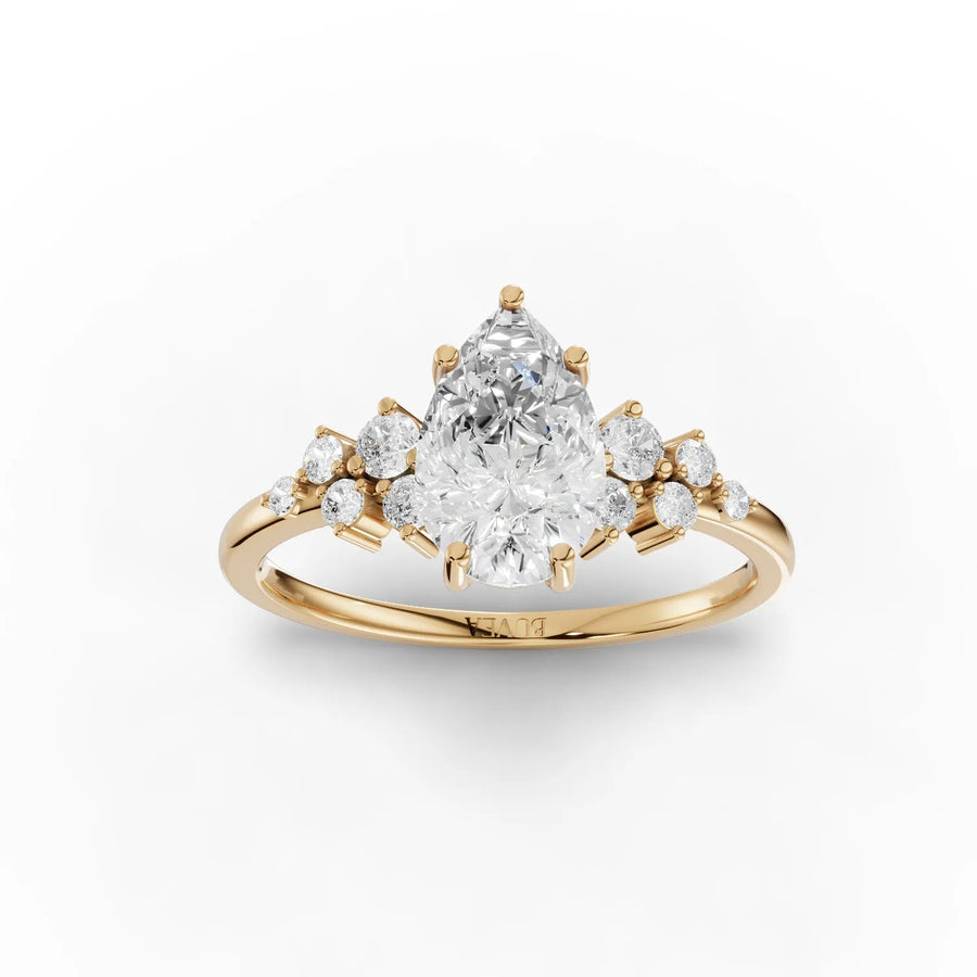 Pear-shaped lab-grown diamond ring yellow gold top view