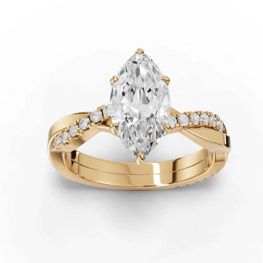 Yellow gold marquise pavé engagement ring