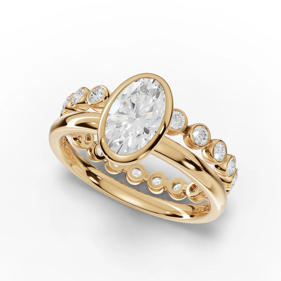 1.63 Ct oval lab grown diamond bezel-set ring in polished 18K gold, featuring side stones for added brilliance and security.