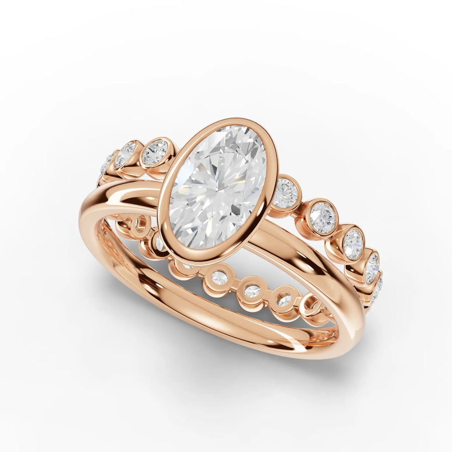 1.63 Ct oval lab grown diamond bezel ring in polished 18K rose gold, featuring a central oval diamond and surrounding channel-set stones.