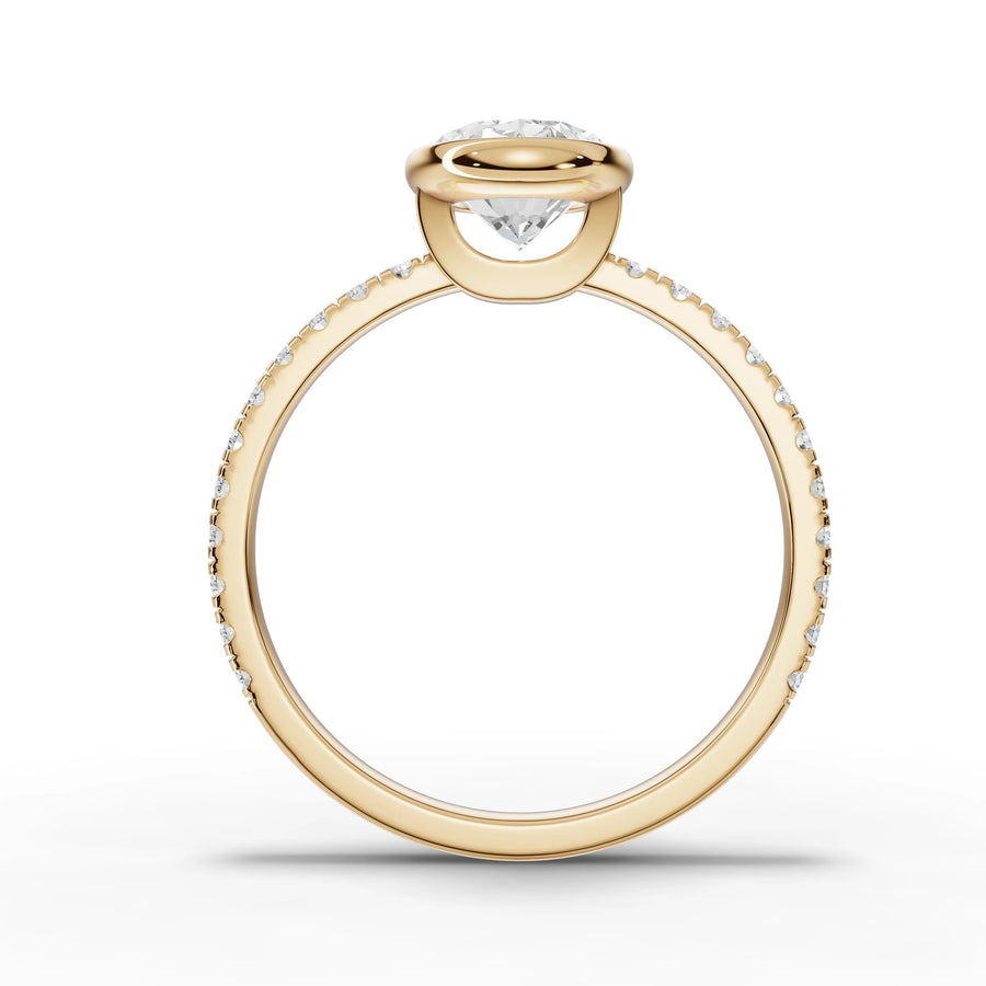 Oval bezel lab-grown ring yellow gold close-up