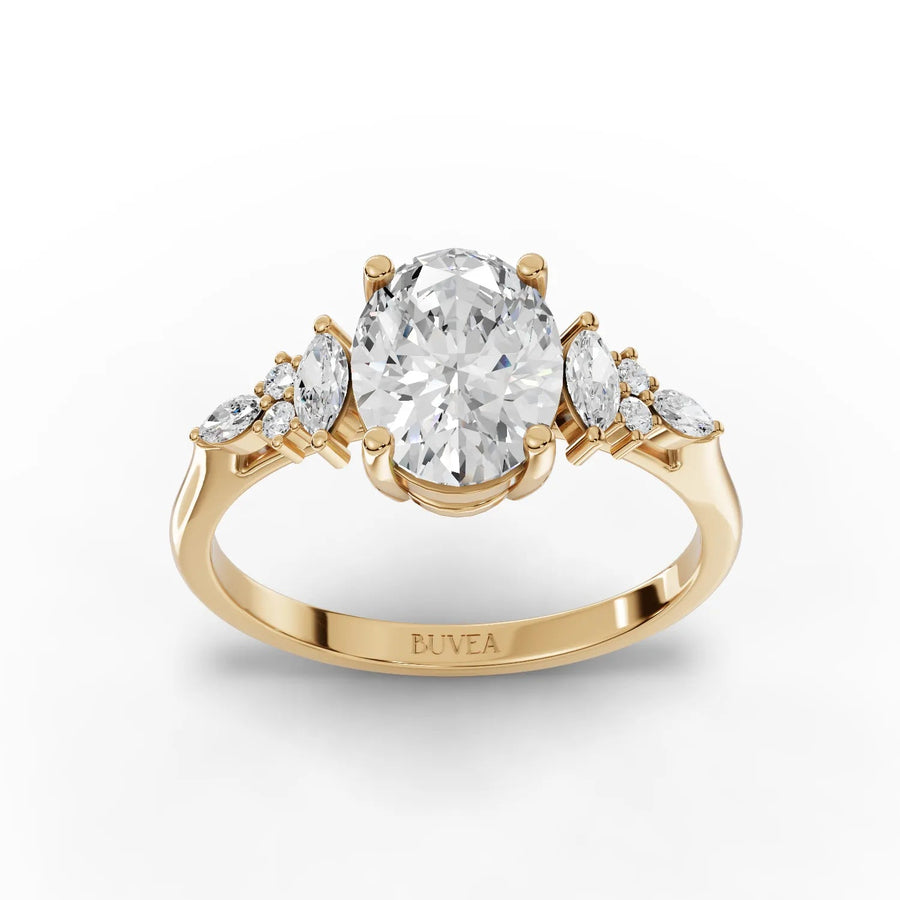 Oval three-stone lab-grown diamond ring yellow gold top view