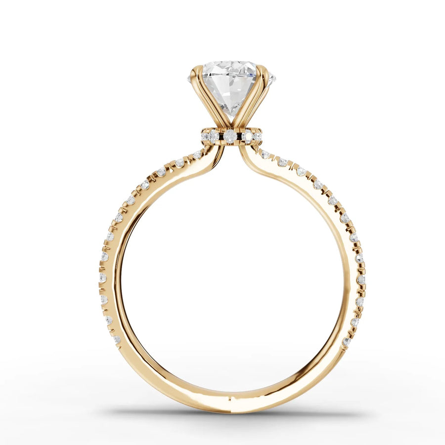 Oval lab-grown diamond ring yellow gold close-up