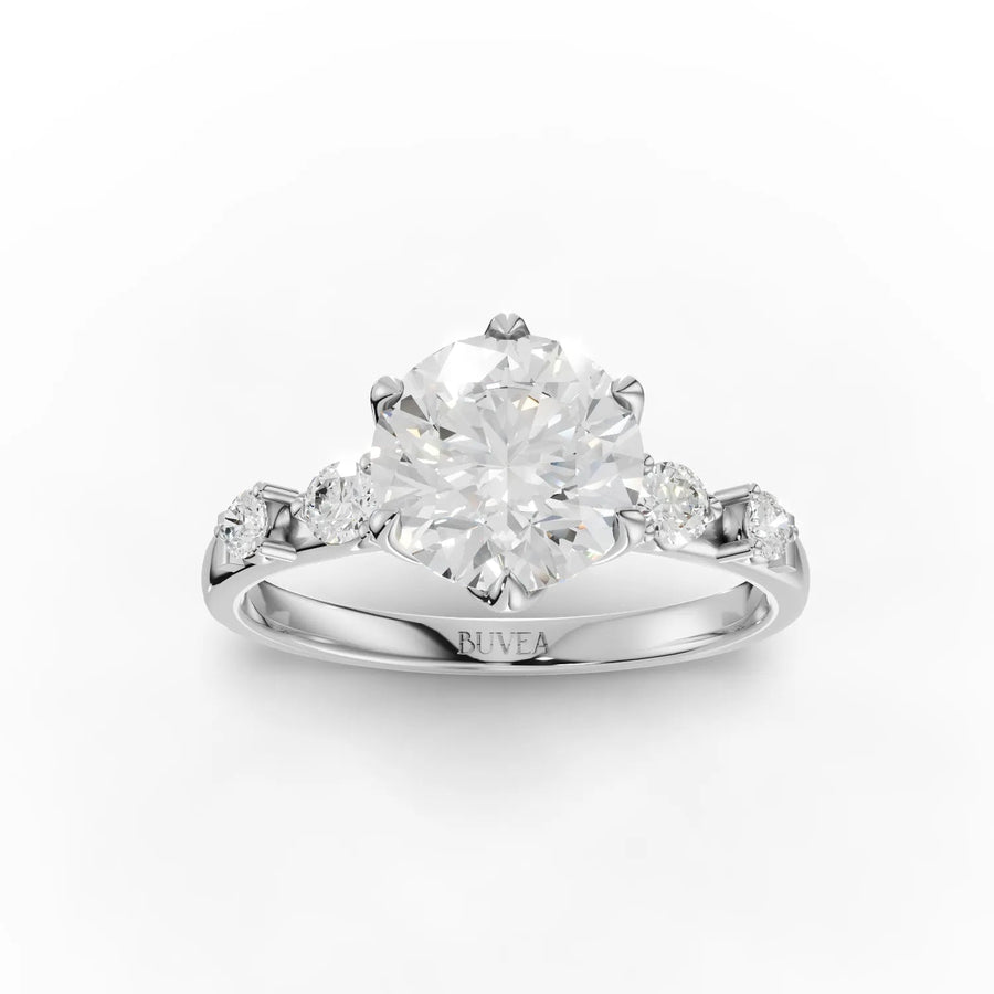 1.70 Ct round lab diamond three-stone ring with 1.50 Ct center stone and gold prong setting