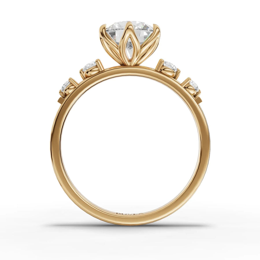 Round center trio ring yellow gold close-up view