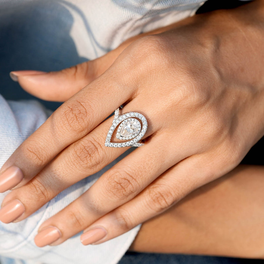 1.85 CT pear double-halo diamond ring worn on hand