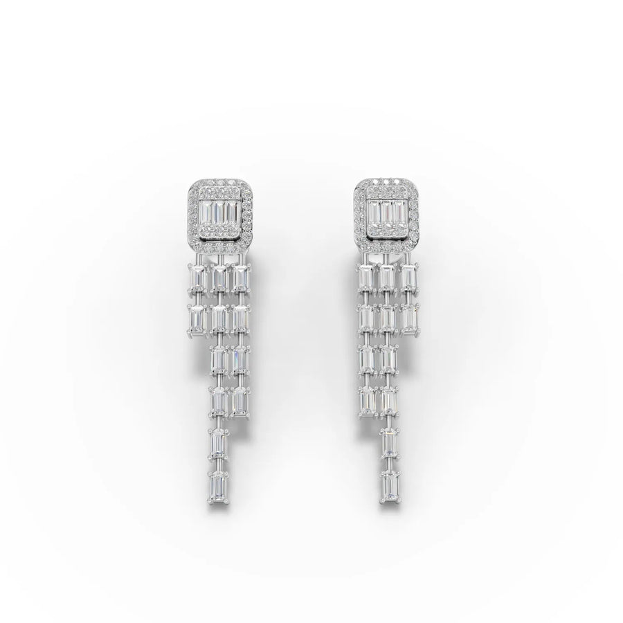 Baguette halo drop earrings featuring a micro prong setting in 18k gold, showcasing a cascading design.