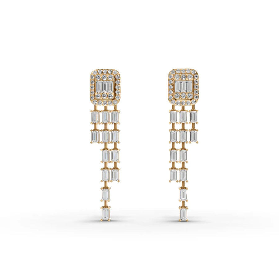 Dangle earrings featuring 1.44 ct lab grown diamonds, with a halo top and vertically aligned baguette drops in 18k gold.