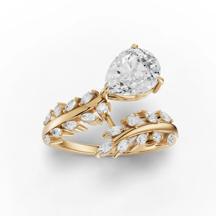 Yellow gold pear halo diamond ring
