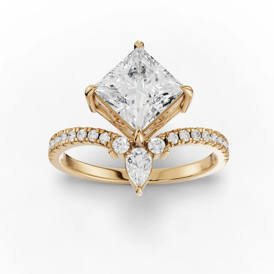 Yellow gold princess pear diamond ring