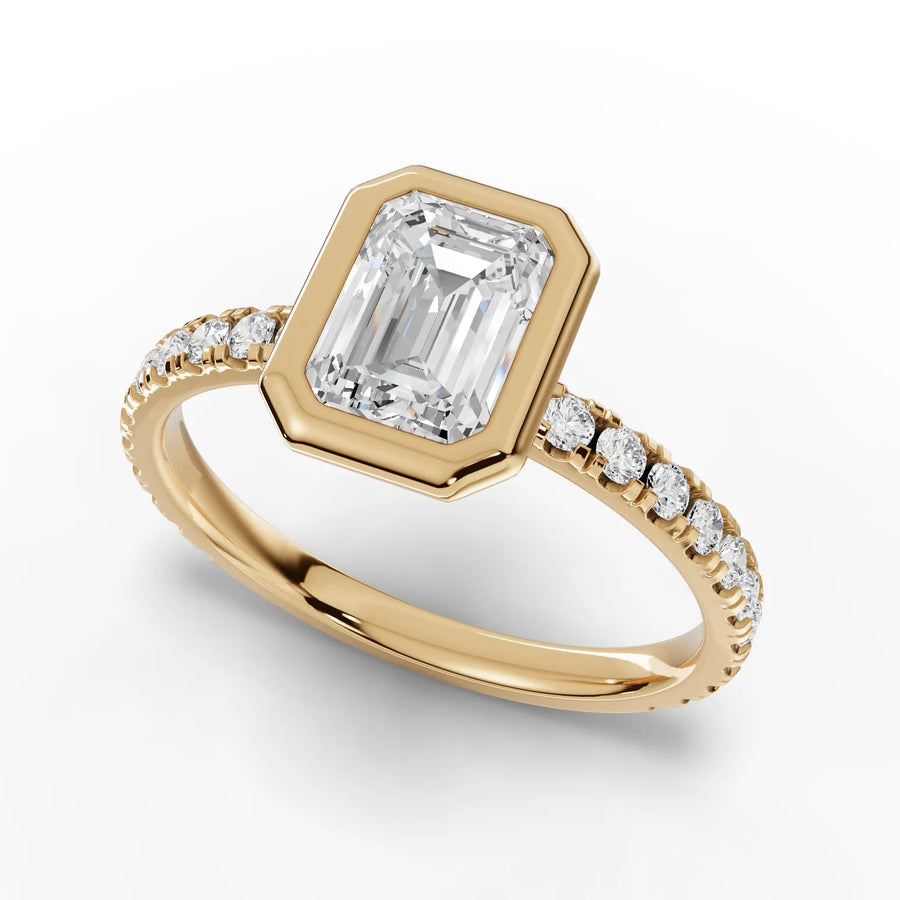 Emerald bezel diamond band ring yellow gold angle