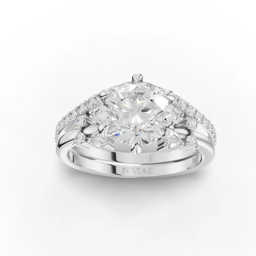 1.93 CT round lab diamond ring with 1.5 CT center stone, six-prong setting, split shank, and accent diamonds in 18K gold
