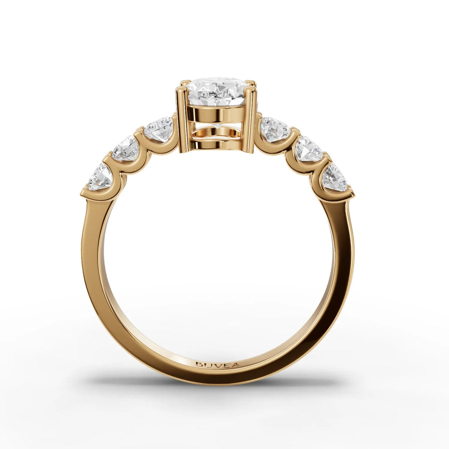 Oval center ring yellow gold close-up