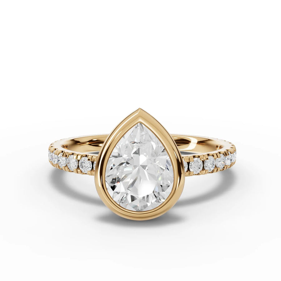 Pear bezel diamond band ring yellow gold angle