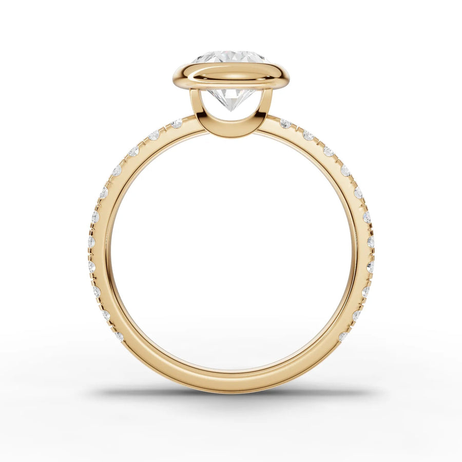 Pear bezel lab-grown ring yellow gold close-up