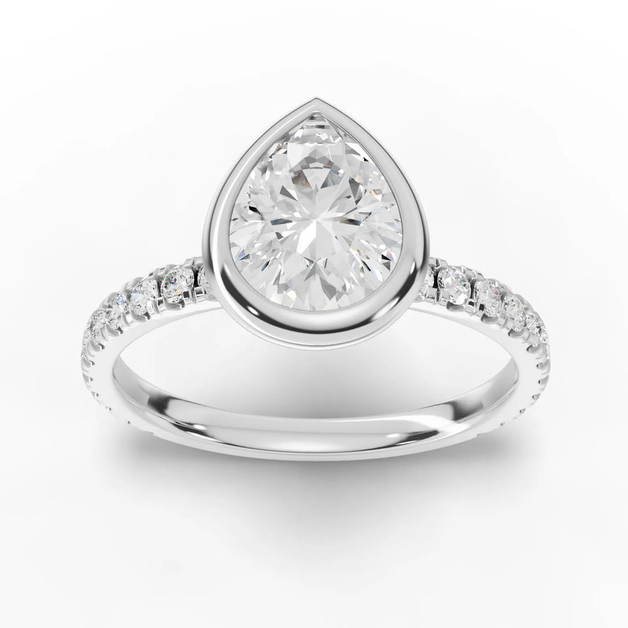 1.84 CT pear bezel lab grown diamond ring with 1.50 CT center stone and round accent diamonds on the band