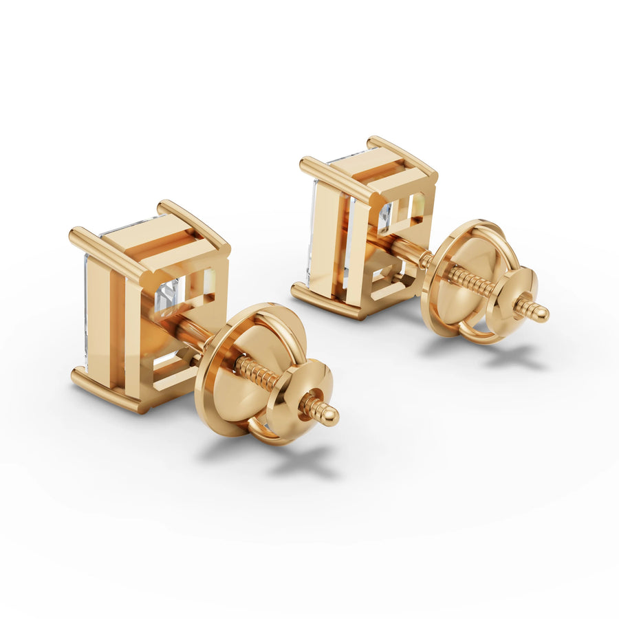Emerald lab-grown stud earrings yellow gold close-up