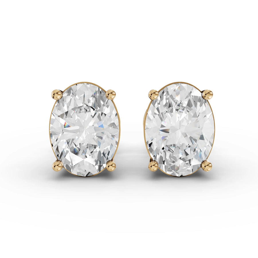 2.18 CT oval lab-grown diamond stud earrings yellow gold front