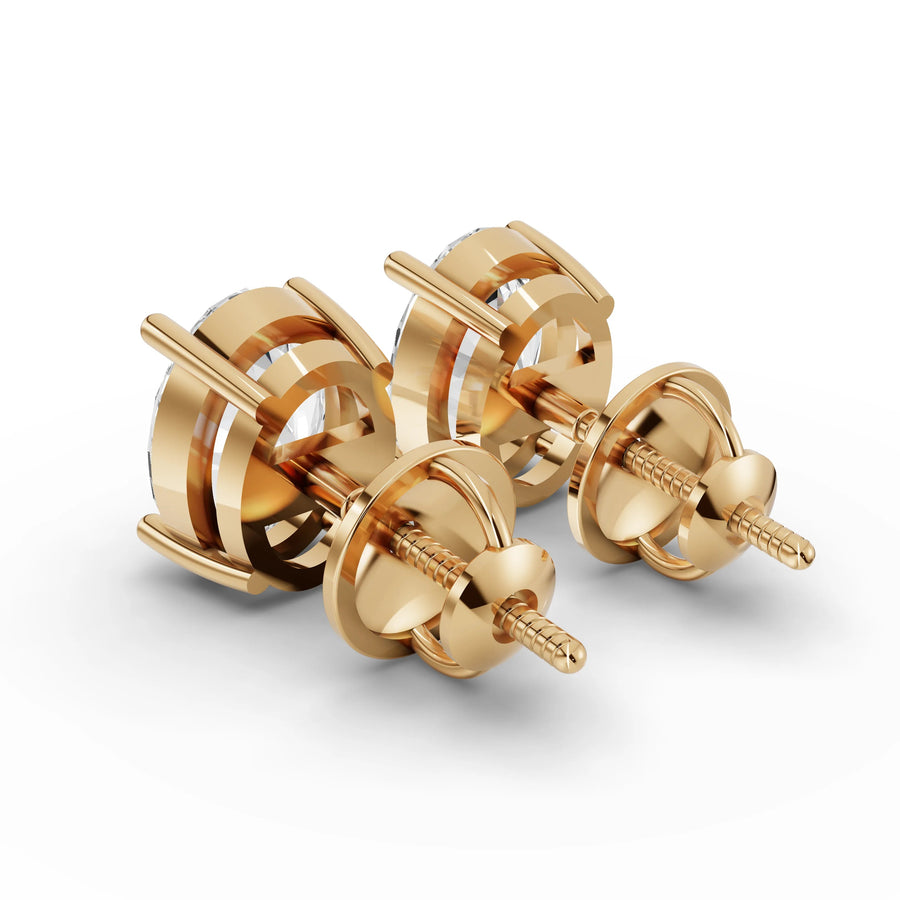 Oval lab-grown stud earrings yellow gold close-up