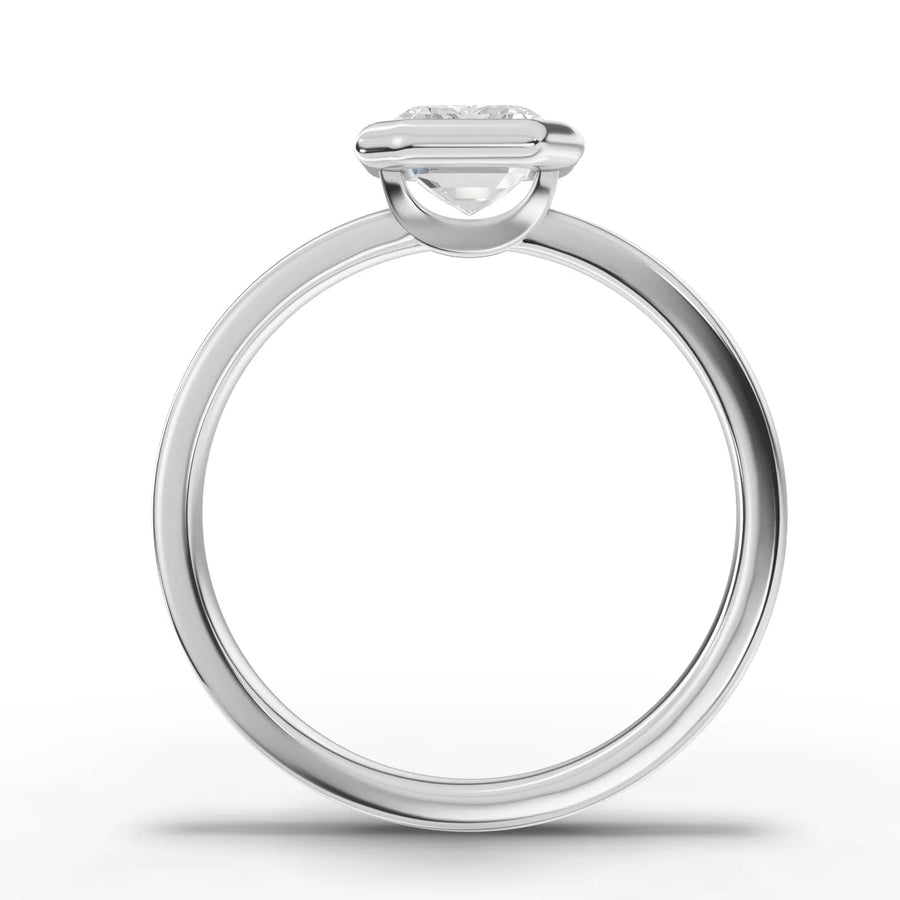 Emerald bezel lab-grown ring white gold close-up