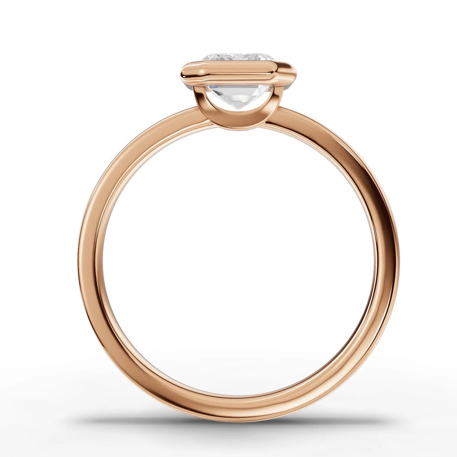 Emerald bezel lab-grown ring rose gold close-up