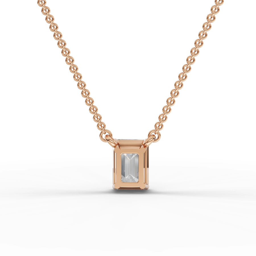 Lab-grown emerald pendant rose gold close-up
