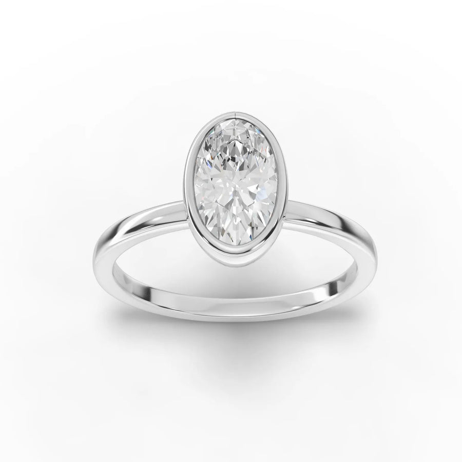 1.00 CT oval lab diamond solitaire ring in 18K gold with a polished band and bezel-style center setting