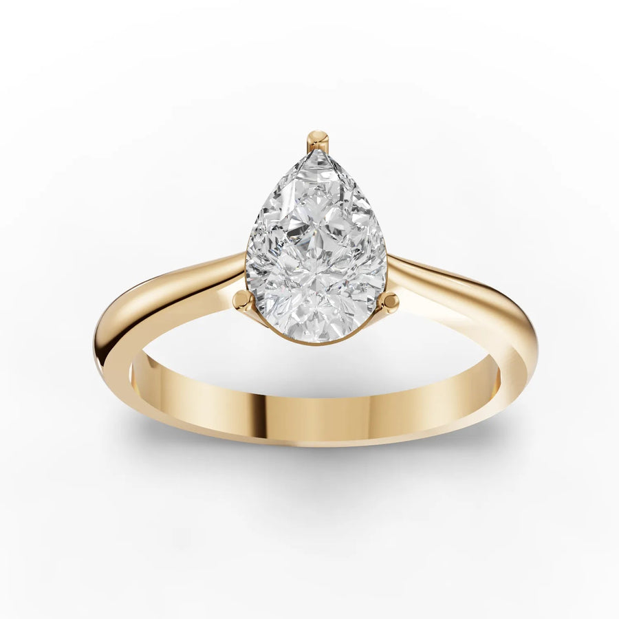 1.00 CT pear lab-grown diamond ring yellow gold top