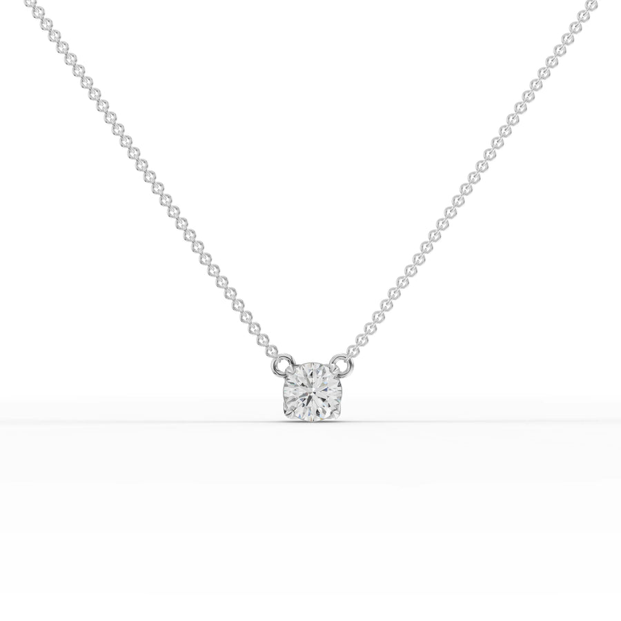 1 ct round lab grown diamond solitaire pendant necklace with four-prong setting on a delicate gold chain