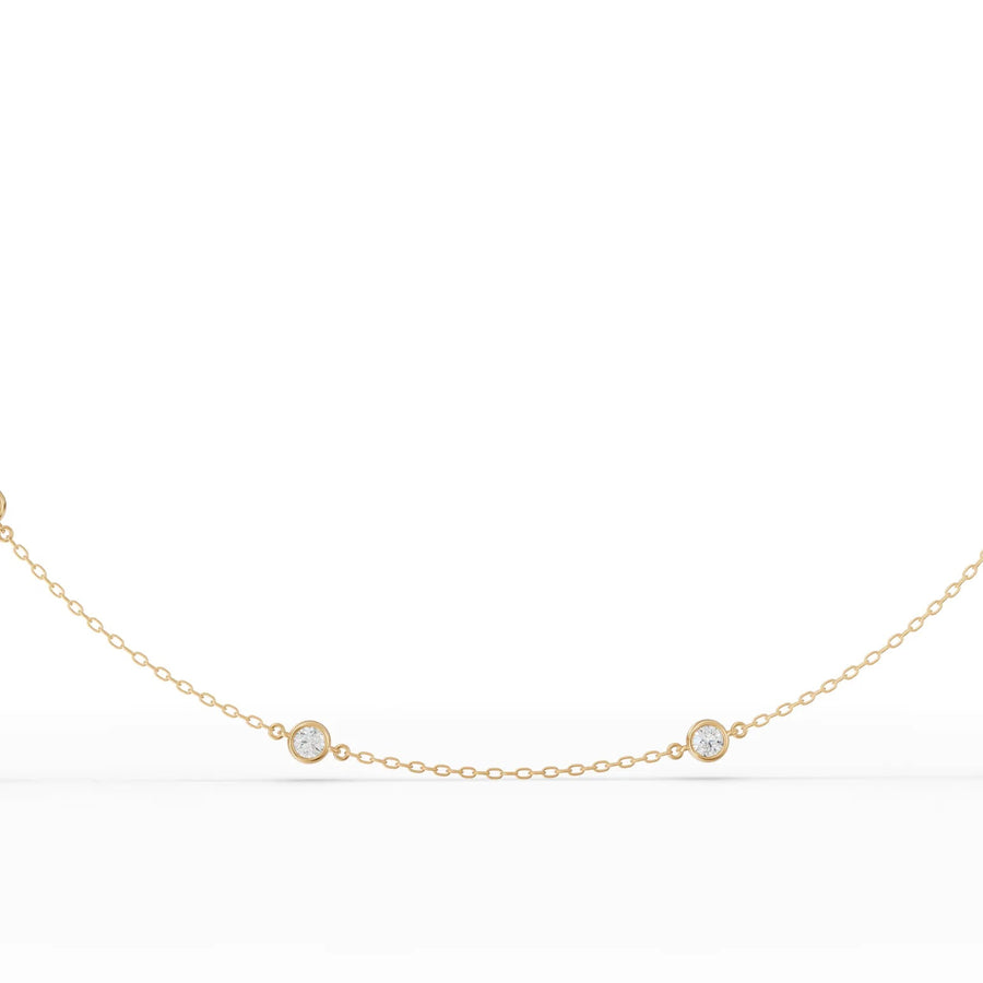 Lab-grown diamond bezel necklace yellow gold close-up